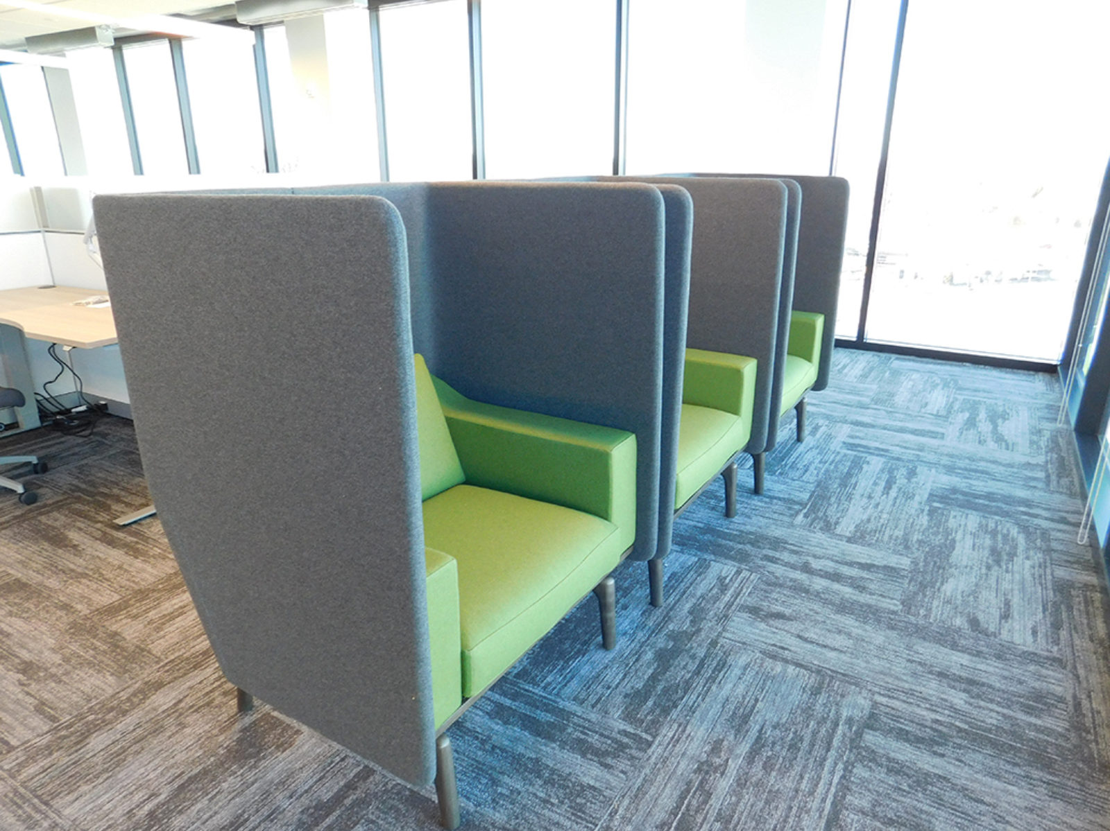Set of three privacy lounge seating with green seats and grey screens