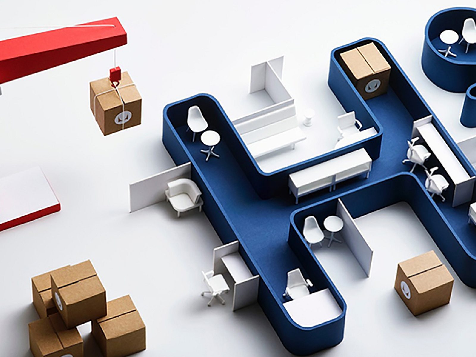 A red crane and blue boxes arranged on a white surface.