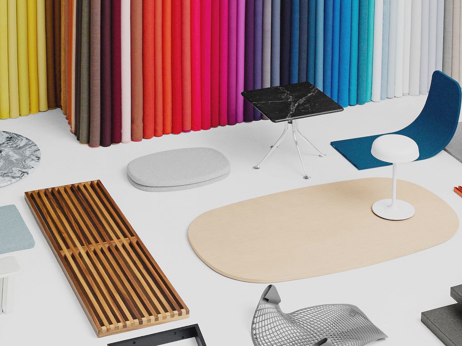 Variety of colors in background, with parts of different furniture pieces laid out in strategic pairings.