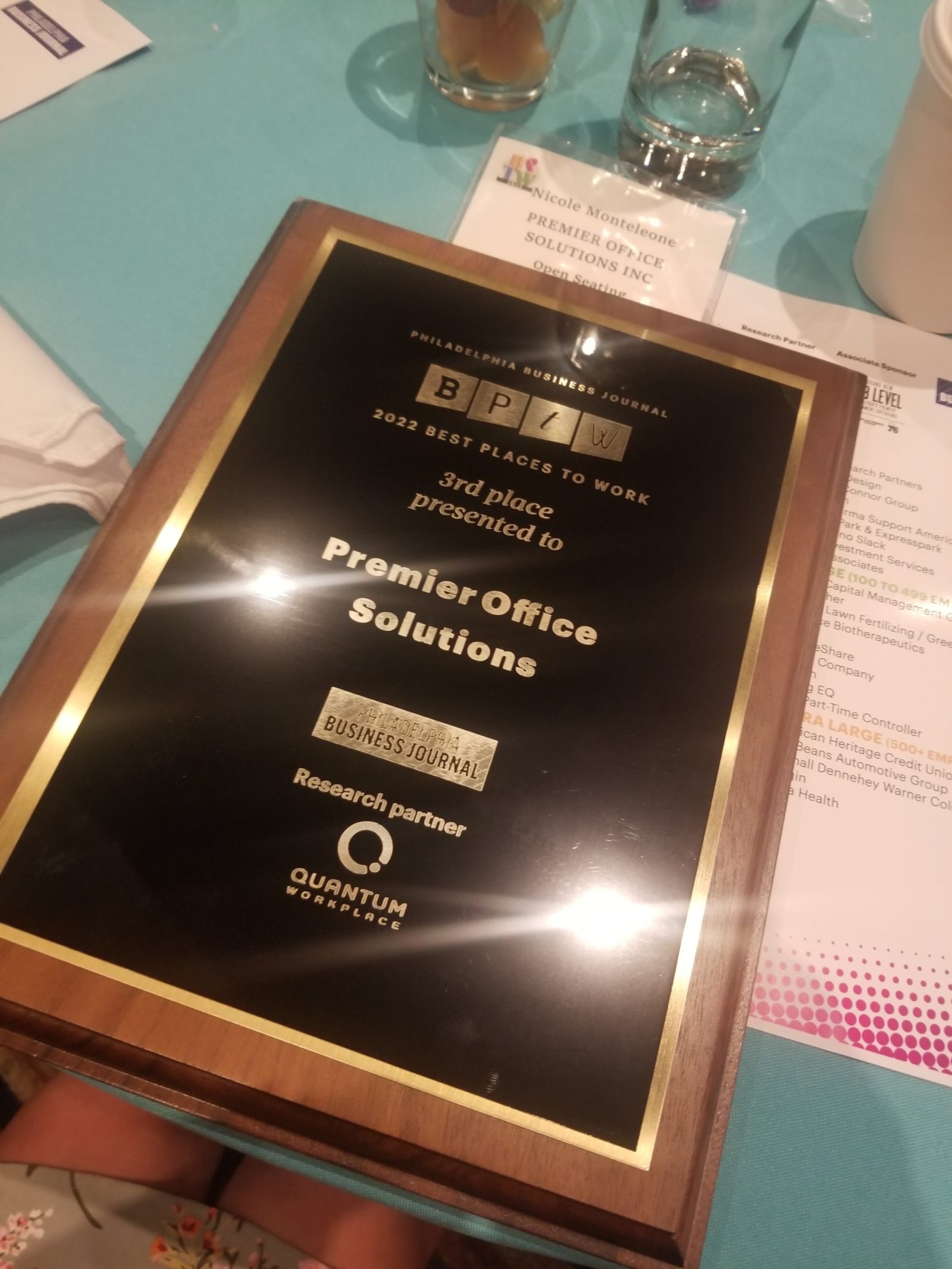 Plaque stating that Premier Office Solutions won Best Places to Work.