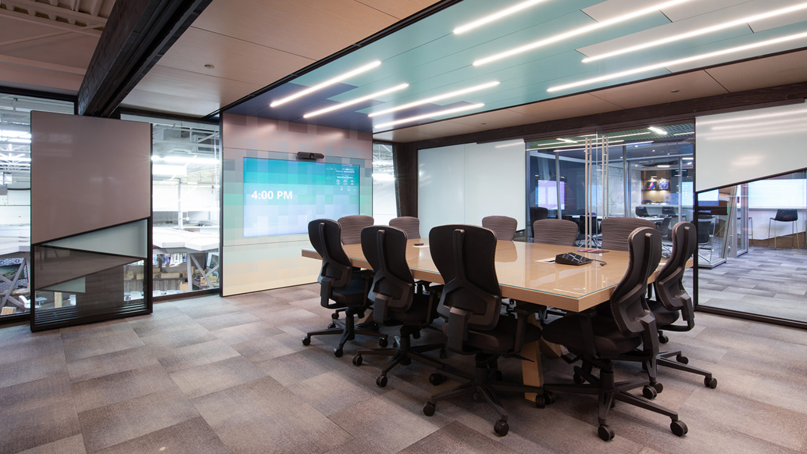 Conference room with DIRTT solution, integrated screens, lighting, panels and doors